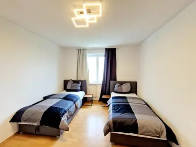 Ein Bett oder Betten in einem Zimmer der Unterkunft Cozy apartment in Auerbach, 55 m², mountain view