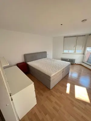 Ein Bett oder Betten in einem Zimmer der Unterkunft Monteurwohnung Karlsruhe - L8 Street