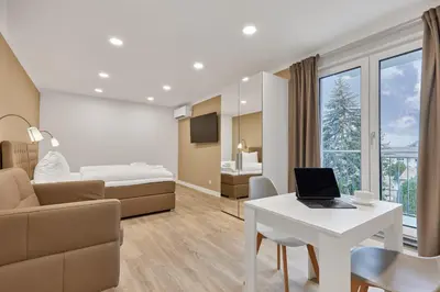 Ein Bett oder Betten in einem Zimmer der Unterkunft Boardinghotel Premium Heidelberg