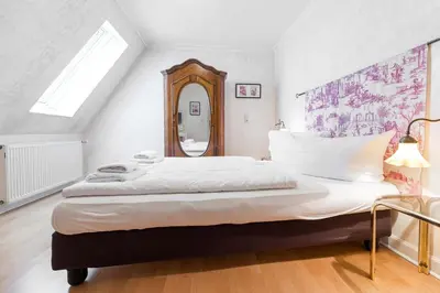 Ein Bett oder Betten in einem Zimmer der Unterkunft Hotel Leone d´Oro
