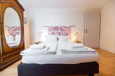 Ein Bett oder Betten in einem Zimmer der Unterkunft Hotel Leone d´Oro