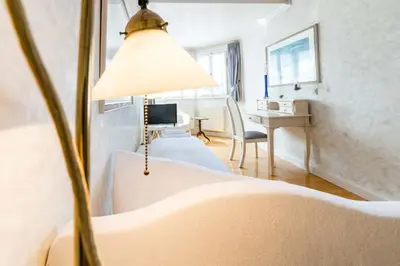Ein Bett oder Betten in einem Zimmer der Unterkunft Hotel Leone d´Oro