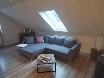 Ein Sitzbereich in der Unterkunft Ferienwohnung Fleckenstein