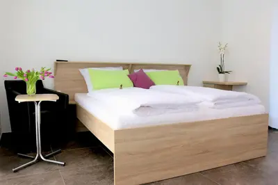 Ein Bett oder Betten in einem Zimmer der Unterkunft Alte Stadtmauer - Apartment