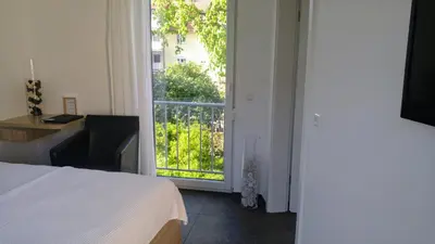 Ein Bett oder Betten in einem Zimmer der Unterkunft Alte Stadtmauer - Apartment