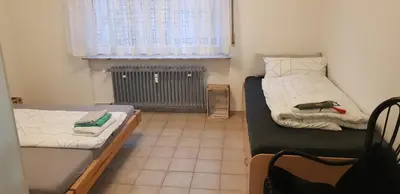 Ein Bett oder Betten in einem Zimmer der Unterkunft Joanna Apartment - Schwetzingen 2