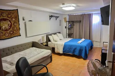 Ein Bett oder Betten in einem Zimmer der Unterkunft C&A Apartments