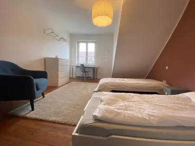 Ein Bett oder Betten in einem Zimmer der Unterkunft Apt5 - Ferienwohnung Brötzingen im 4 OG