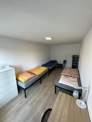 Ein Bett oder Betten in einem Zimmer der Unterkunft Nice, big and central apartment with 2 balconies