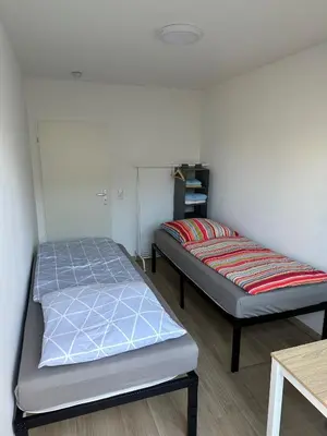 Ein Bett oder Betten in einem Zimmer der Unterkunft Nice, big and central apartment with 2 balconies
