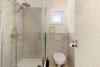 Ein Badezimmer in der Unterkunft Bungalow für 2 - Parkplatz - Küche - Terrasse