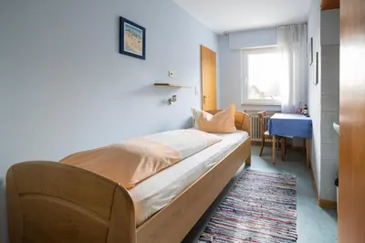 Ein Bett oder Betten in einem Zimmer der Unterkunft Gasthaus Krone