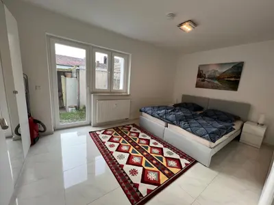 Ein Bett oder Betten in einem Zimmer der Unterkunft Wunderschöne Unterkunft mit Terrasse - 24h7t Checkin