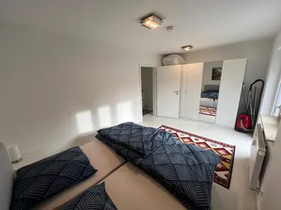 Ein Bett oder Betten in einem Zimmer der Unterkunft Wunderschöne Unterkunft mit Terrasse - 24h7t Checkin