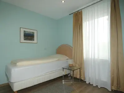 Ein Bett oder Betten in einem Zimmer der Unterkunft Hotel Yel