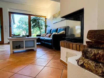 Ein Bett oder Betten in einem Zimmer der Unterkunft Herzensort - Schönes Haus mit Terrasse und Gartenblick