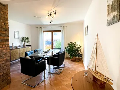 Ein Sitzbereich in der Unterkunft Herzensort - Schönes Haus mit Terrasse und Gartenblick