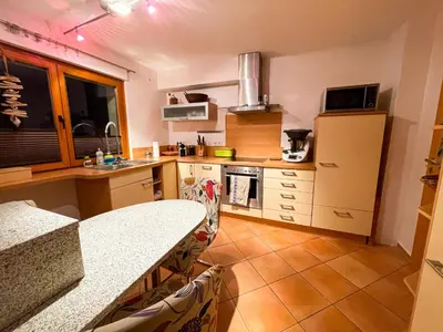 Küche/Küchenzeile in der Unterkunft Herzensort - Schönes Haus mit Terrasse und Gartenblick