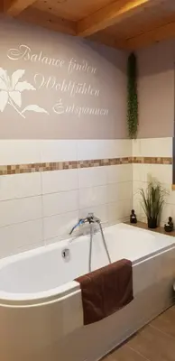 Ein Badezimmer in der Unterkunft Harmonie