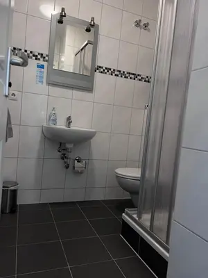 Ein Badezimmer in der Unterkunft Sleep & Living Forst ehem Corona