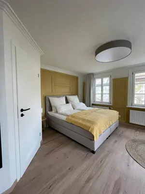 Ein Bett oder Betten in einem Zimmer der Unterkunft Altes Rathaus