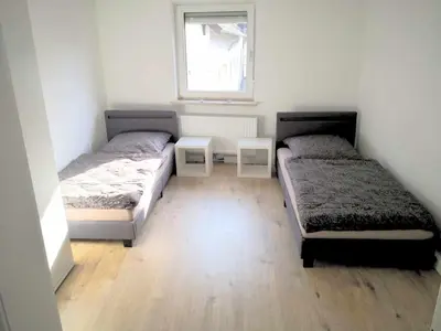 Ein Bett oder Betten in einem Zimmer der Unterkunft Spacious 6 Room Flat *Balcony & Terrace*