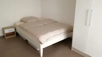 Ein Bett oder Betten in einem Zimmer der Unterkunft Apartment mit Terrasse in Abstatt