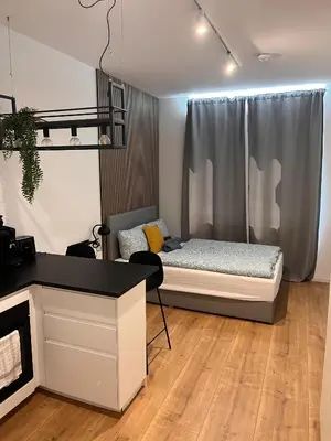 Ein Bett oder Betten in einem Zimmer der Unterkunft Modernes Apartment Karlsruhe