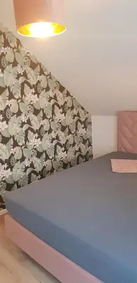 Ein Bett oder Betten in einem Zimmer der Unterkunft Joanna Apartment - Worms