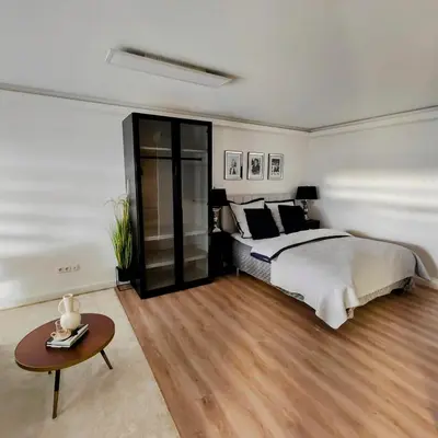 Ein Bett oder Betten in einem Zimmer der Unterkunft Exklusiv, modernes Apartment