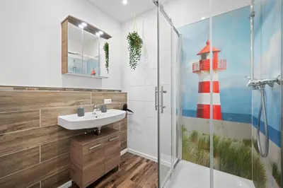 Ein Badezimmer in der Unterkunft BackHome - SUITE L - Parkhaus - Fantastische Schlosslage - SmartTV - Waschmaschine - Netflix - 50qm - 24h Checkin- Apartment 1