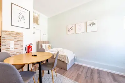 Ein Sitzbereich in der Unterkunft BackHome - SUITE L - Parkhaus - Fantastische Schlosslage - SmartTV - Waschmaschine - Netflix - 50qm - 24h Checkin- Apartment 1