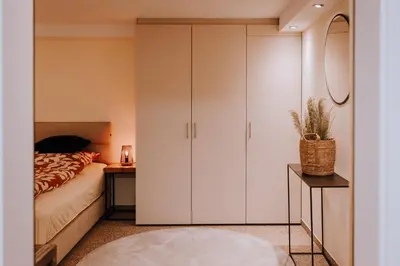Ein Bett oder Betten in einem Zimmer der Unterkunft Wald Idyll Klingenberg Designhaus mit Klimaanlage Hollands Ferienhaus