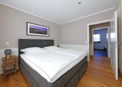 Ein Bett oder Betten in einem Zimmer der Unterkunft Ferienwohnung Mayr