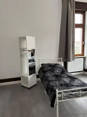 Ein Bett oder Betten in einem Zimmer der Unterkunft 1 Zimmer für 2 Personen Bruchsal