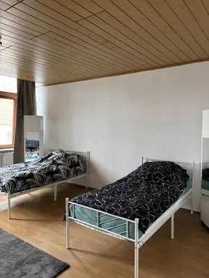 Ein Bett oder Betten in einem Zimmer der Unterkunft 1 Zimmer für 2 Personen Bruchsal