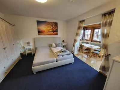 Ein Bett oder Betten in einem Zimmer der Unterkunft Hotel Schönblick