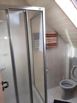 Ein Badezimmer in der Unterkunft Gästezimmer Löhrbacher Tal