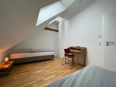 Ein Bett oder Betten in einem Zimmer der Unterkunft Schöne Apartments auf dem Weingut Schätzel