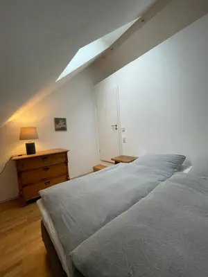 Ein Bett oder Betten in einem Zimmer der Unterkunft Schöne Apartments auf dem Weingut Schätzel