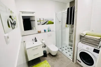 Ein Badezimmer in der Unterkunft 2 Room Galerie Einliegerwohnung in Rheinstetten, Messe Nähe, Rollstuhlfahrer geeignet