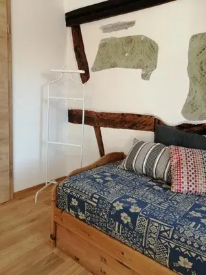 Ein Bett oder Betten in einem Zimmer der Unterkunft Ferienwohnung im Auszeithaus Hohenlohe
