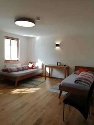 Ein Bett oder Betten in einem Zimmer der Unterkunft Ferienwohnung im Auszeithaus Hohenlohe