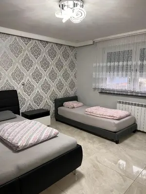 Ein Bett oder Betten in einem Zimmer der Unterkunft LK FeWo