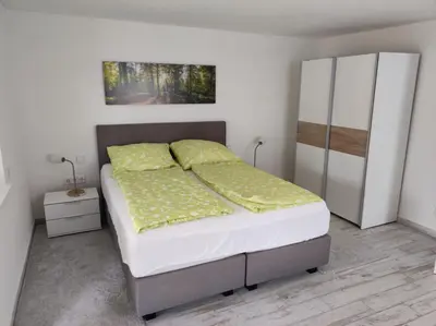 Ein Bett oder Betten in einem Zimmer der Unterkunft Weinseelig14