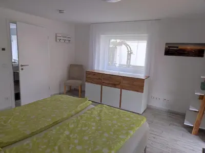 Ein Bett oder Betten in einem Zimmer der Unterkunft Weinseelig14