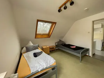 Ein Bett oder Betten in einem Zimmer der Unterkunft Apartments Sülmerstrasse