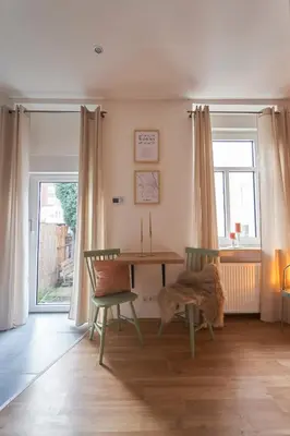 Ein Sitzbereich in der Unterkunft Coole Altbau-WE 1-ZKB Terrasse Worms Zentrum