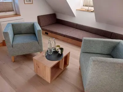 Ein Sitzbereich in der Unterkunft Gasthaus zum Ochsen