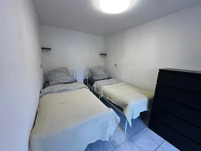 Ein Bett oder Betten in einem Zimmer der Unterkunft Monteurszimmer in Heppenheim Kirschhausen